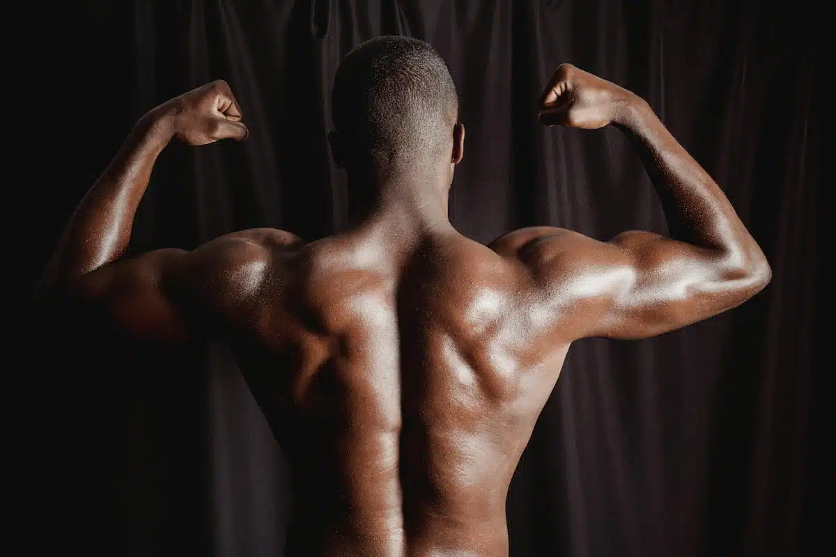 Shirtless Man With Muscular Body Flexing His Muscles