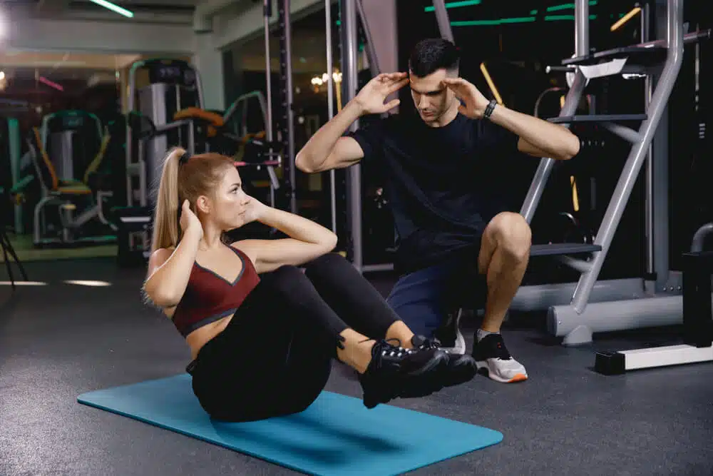 A woman having an exercise at the gym