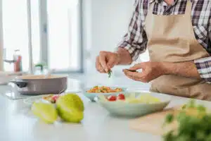 mediteranian diet: man preparing healthy meals