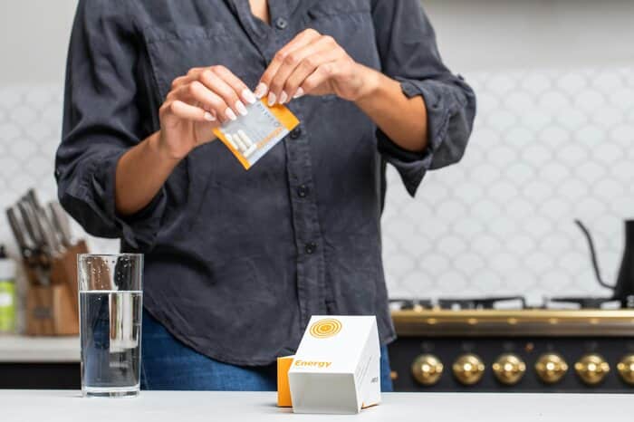 A Person Holding a Pack of Pills